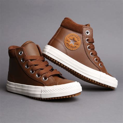 converse high top leather sneakers.